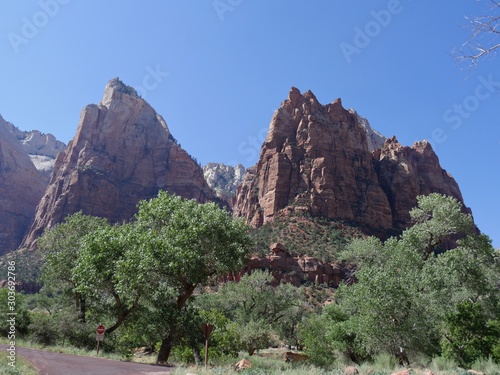 Medium close up of the tall cliffs at the Court of the Patriarchs, named for biblical figures Abraham, Isaac and Jacob at Zion National Park in Utah.