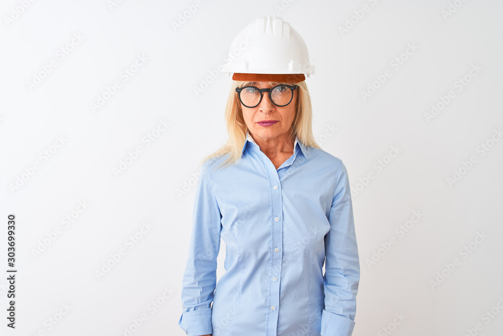 Middle age architect woman wearing glasses and helmet over isolated white background skeptic and nervous, frowning upset because of problem. Negative person. Middle age architect woman wearing glasses and helmet over isolated white background skeptic and nervous, frowning upset because of problem. Negative person.