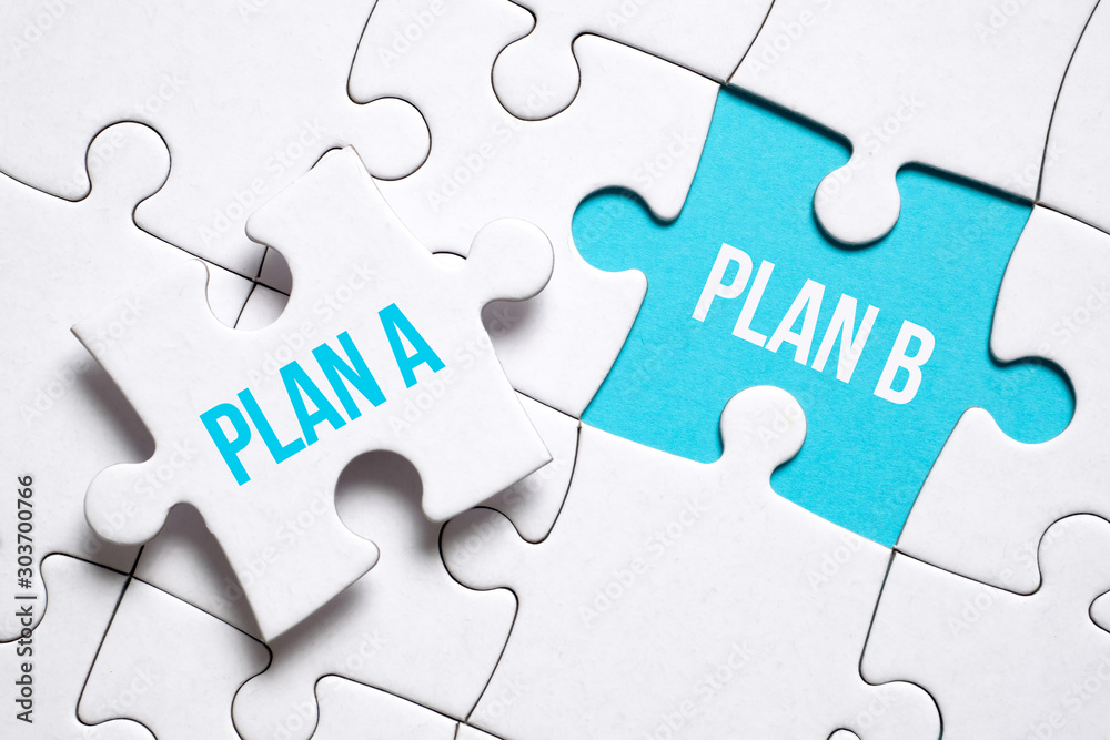 Contingency plan concept. A piece of the puzzle with the inscription holds the fingers of a man next to another on a blue background. Contingency plan concept. A piece of the puzzle with the inscription holds the fingers of a man next to another on a blue background.