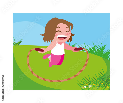 girl smiling and playing with skipping rope