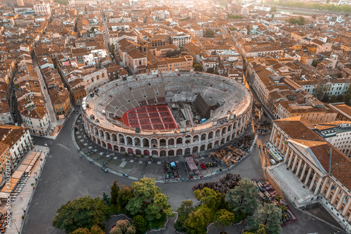 Aerial drone shot view of sunrise on ancient roman amphitheatre Verona Arena (Arena di Verona) in Verona, Italy photo