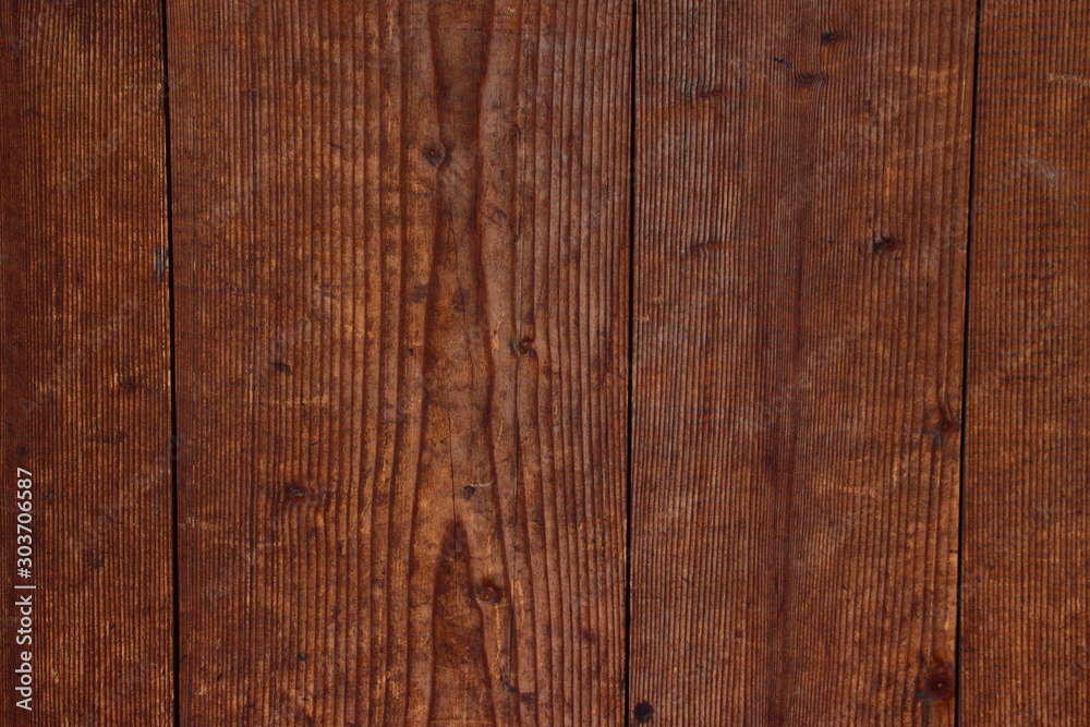 Naklejka premium Old wooden boards with crevices and gaps. Natural wood background.