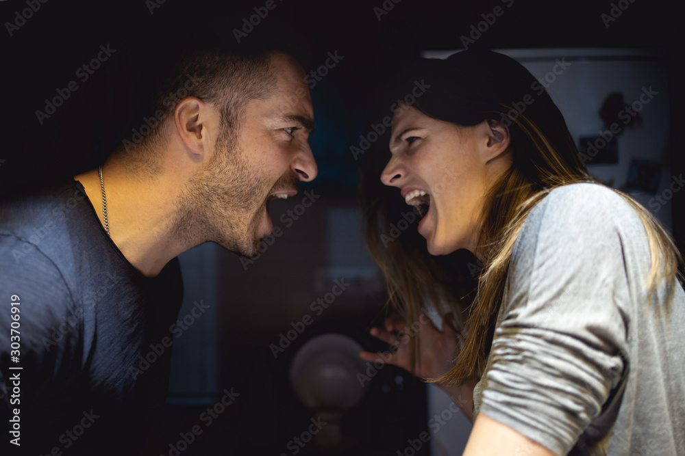 Sexual abuse with a man attacking to a scared woman in a dark place, Sexual abuse with a man attacking to a scared woman in a dark place,