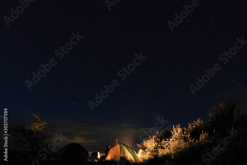 tent under the stars at night