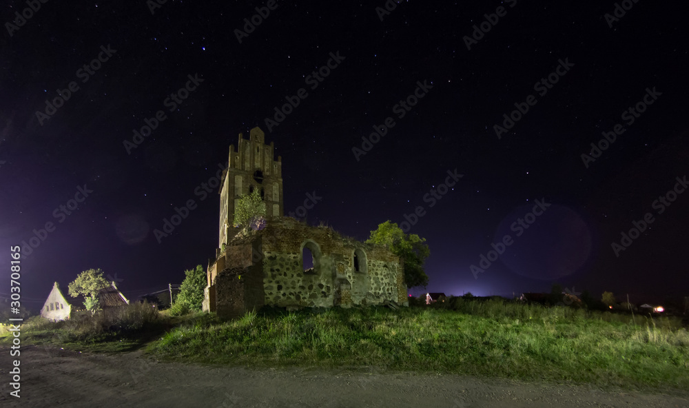 medieval church at night under the stars