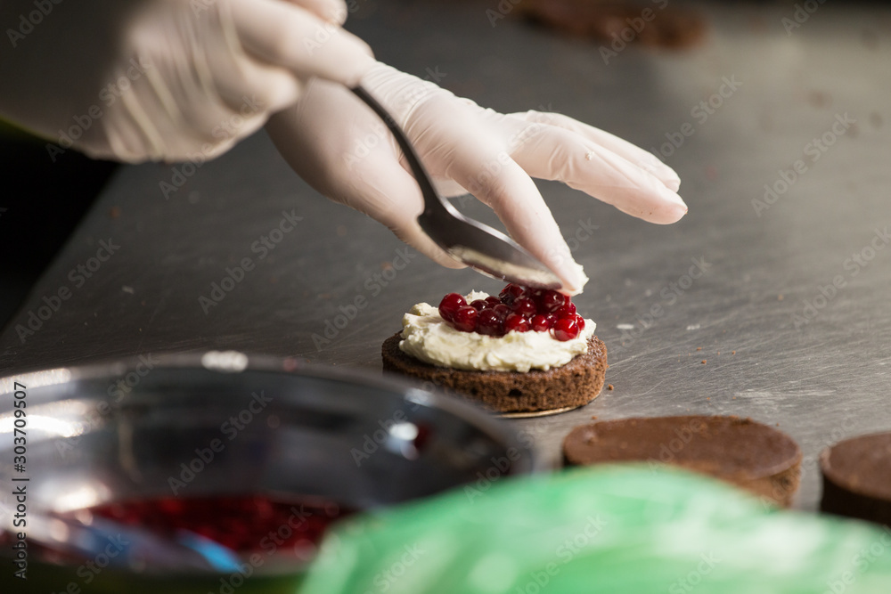 preparation of cakes with cream and berries, preparation of cakes with cream and berries,