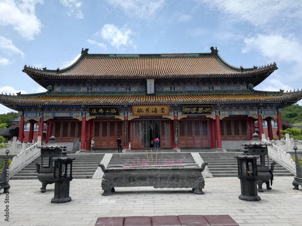 Buddhist Temple with decorative details at the top of the Tianmen Mountain, Hunan Province, Zhangjiajie, China Buddhist Temple with decorative details at the top of the Tianmen Mountain, Hunan Province, Zhangjiajie, China