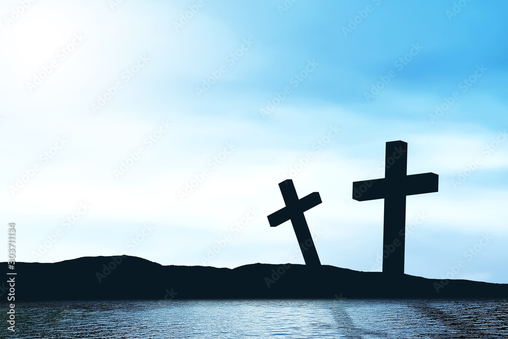 Christian cross by the lake