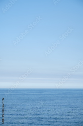 Cloudy horizon and Fog over the sea waves, natural background