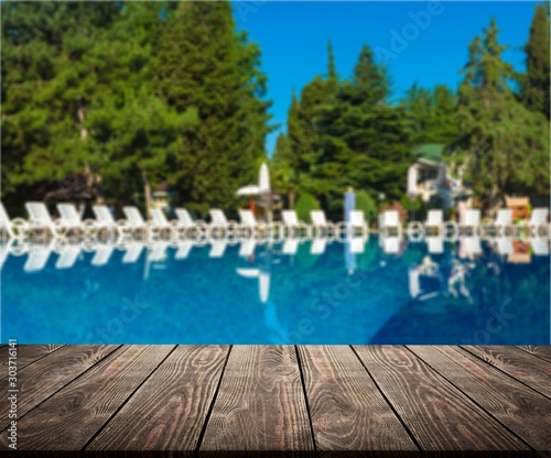 Pool to the Beach with Palms on background