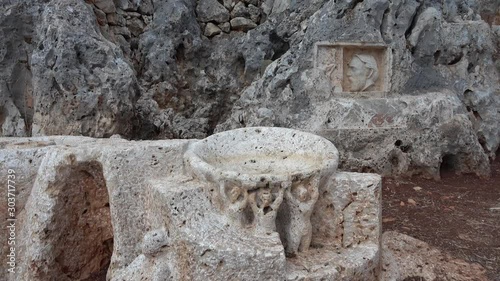 Castellorizo island, Greece - 1st of October 2019: 4K Carvings in rock found on Greek island photo