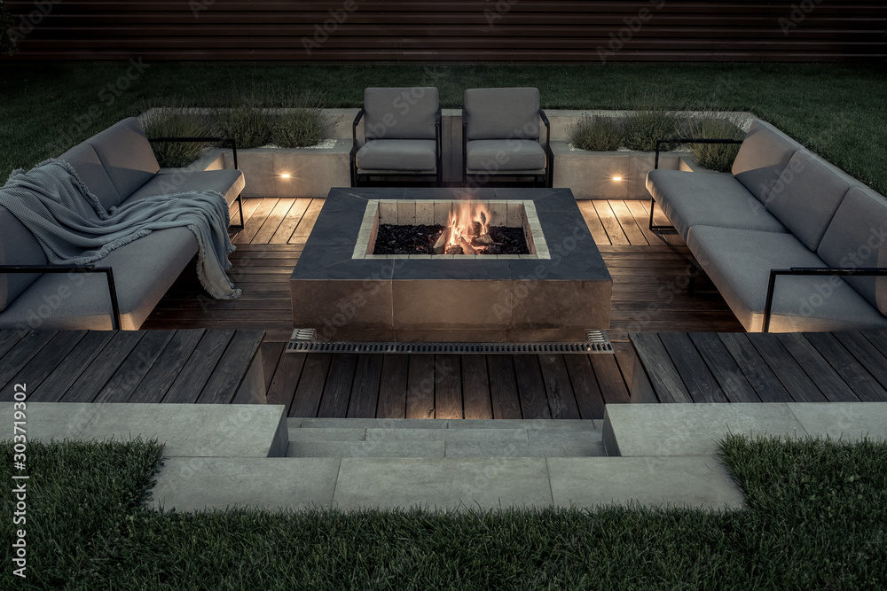 Fotografie Outdoor zone for relax with burning fire pit