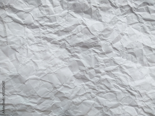 Crumpled paper ball isolated on white background. Crumpled paper texture. White crumpled paper texture for background.