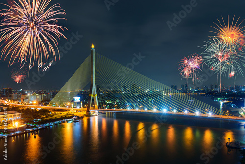 Big Fireworks at Rama VIII Suspension bridge with lighting photo