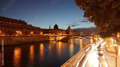 Time Lapse of a bridge over the Seine River in Paris France. photo