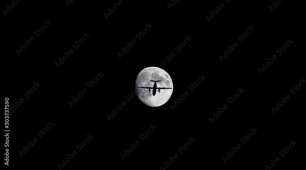 Plane on the background of the full moon. Plane on the background of the full moon.