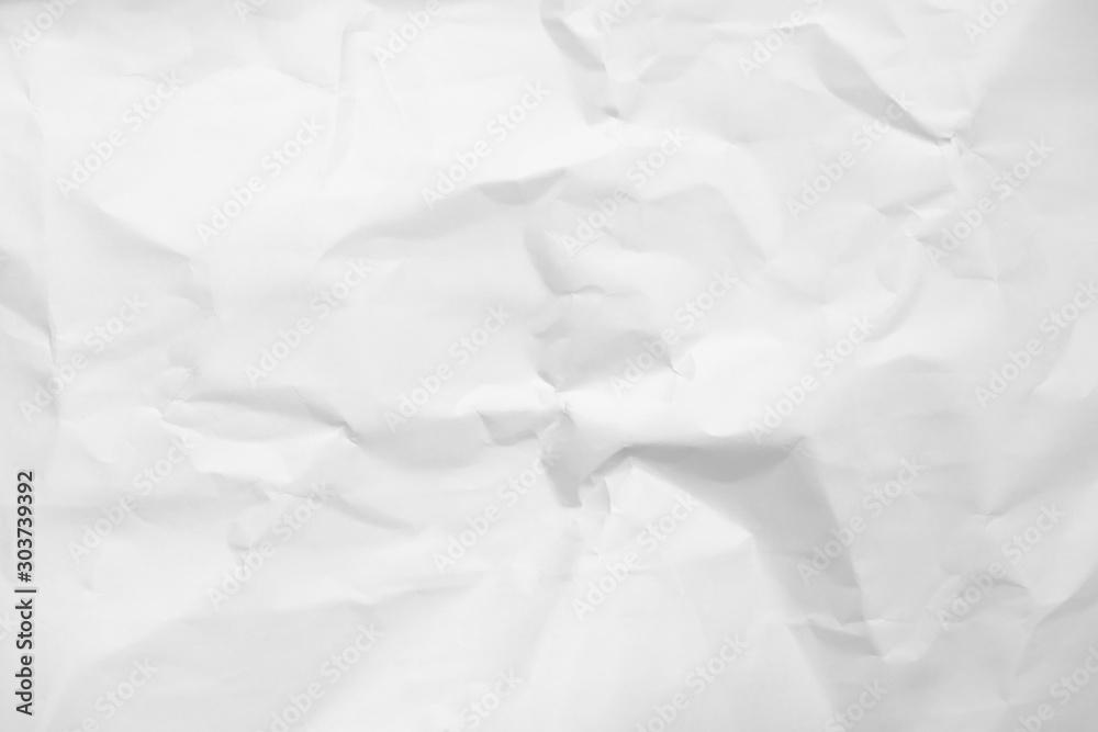 Fototapeta premium White crumpled paper texture background.