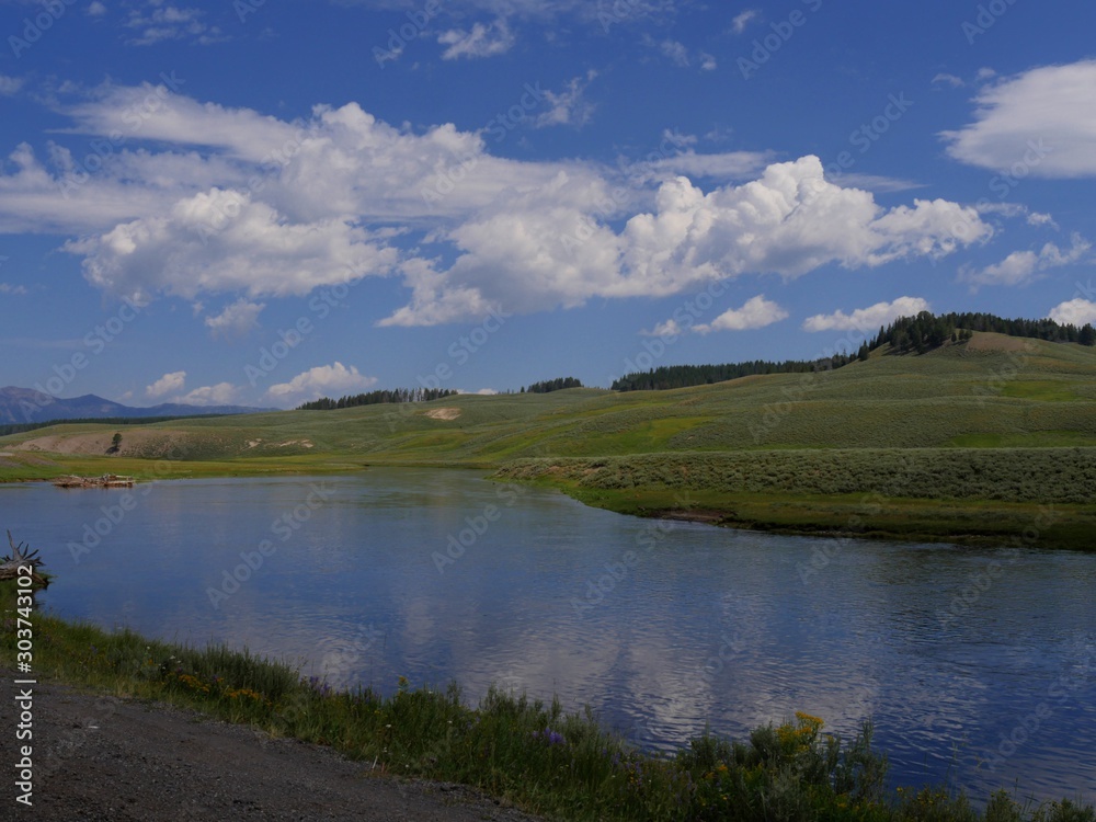 Beautiful landscape with the Yellowstone River at Yellowstone National Park in Wyoming, USA. Beautiful landscape with the Yellowstone River at Yellowstone National Park in Wyoming, USA.