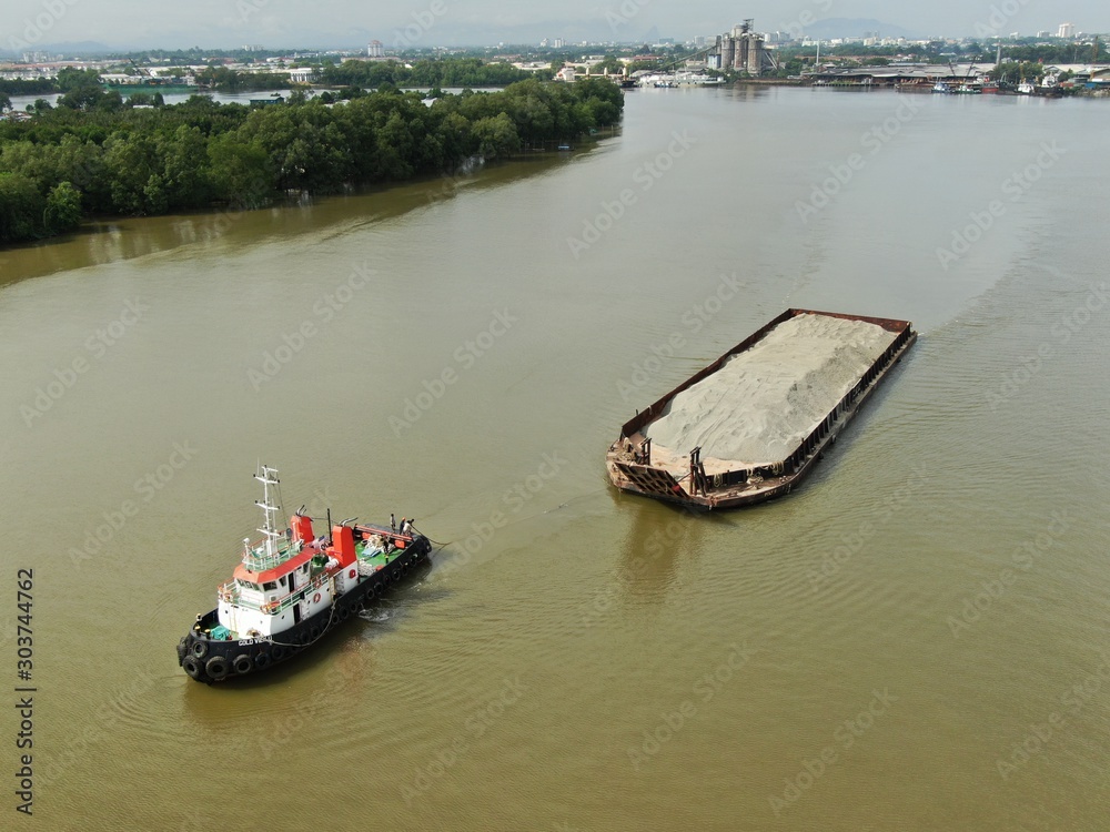 A top down view of a ships and vessels in a port or pier at Kuching, Sarawak, Malaysia
