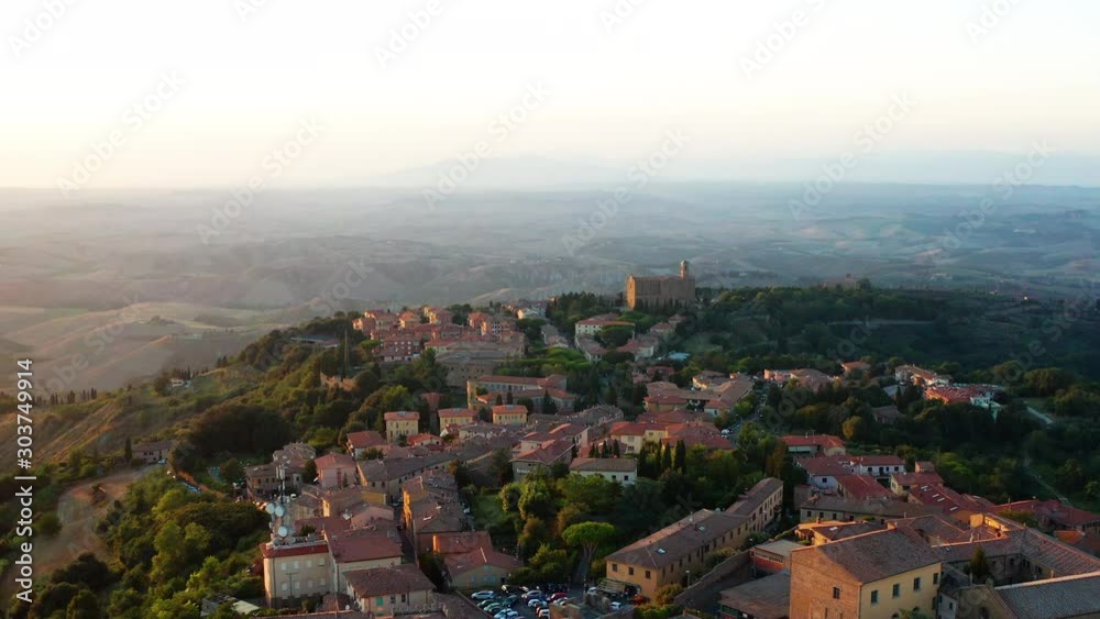 Aerial view of Volterra, Tuscany at sunset. Dolly in footage shot with a drone. Aerial view of Volterra, Tuscany at sunset. Dolly in footage shot with a drone.