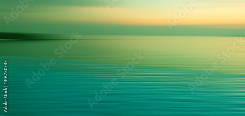 Motion blur background of refraction in water © opasstudio