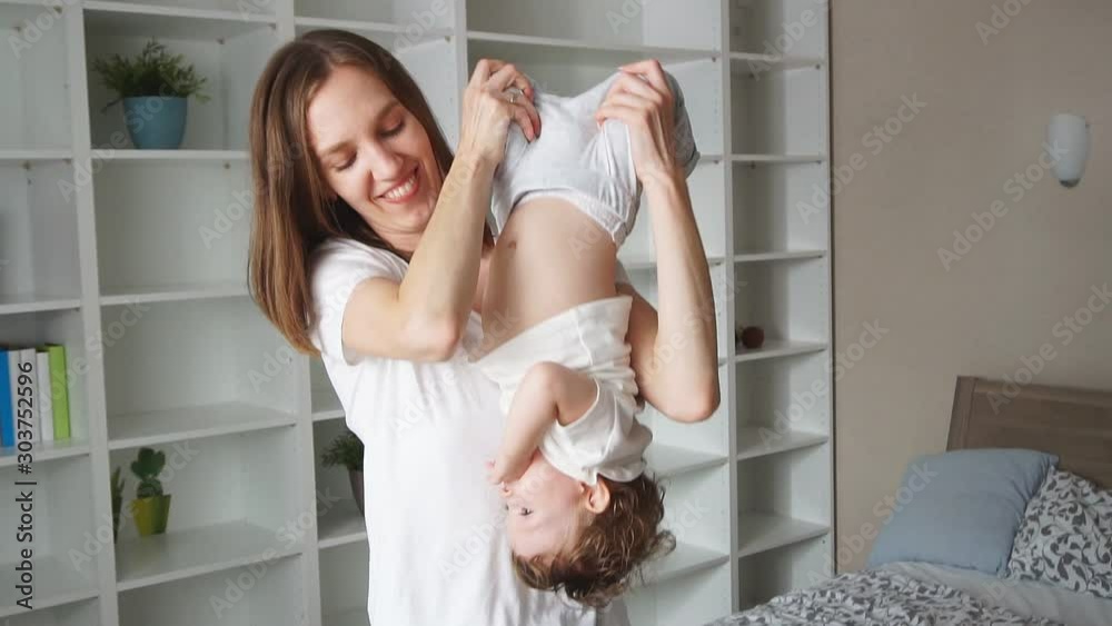 Happy mother enjoying spending time with their daughter, happiness, positive feeling and emotion Happy mother enjoying spending time with their daughter, happiness, positive feeling and emotion