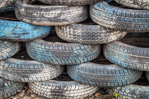 Old tires as a guardrail for the racetrack for safety.