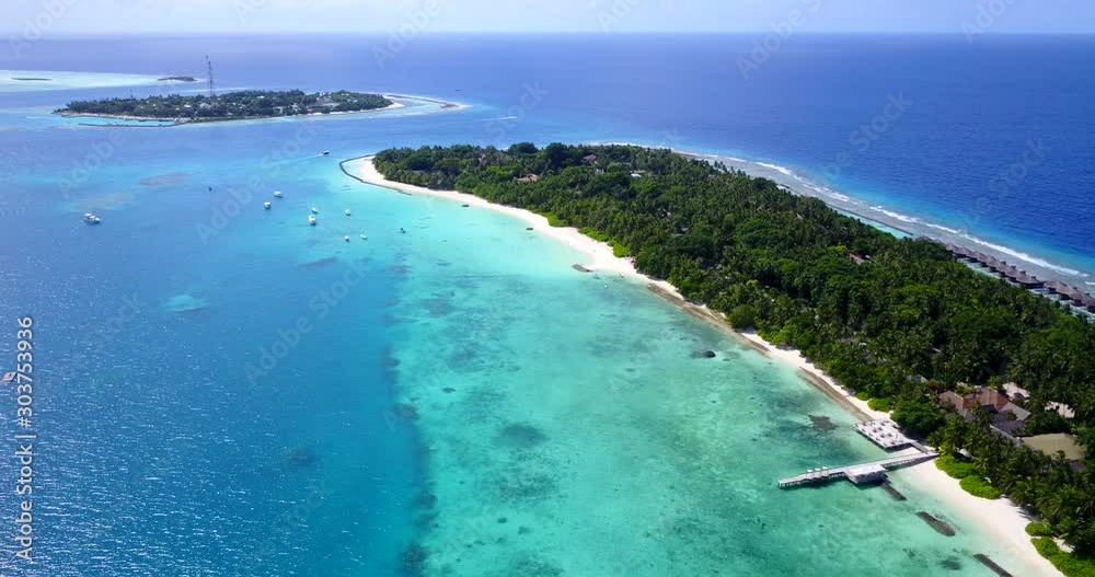 The Islands Of Maldives - Lush Islands Surrounded By Turquoise Blue Waters - A Beautiful Tourist Destination - Aerial Shot The Islands Of Maldives - Lush Islands Surrounded By Turquoise Blue Waters - A Beautiful Tourist Destination - Aerial Shot