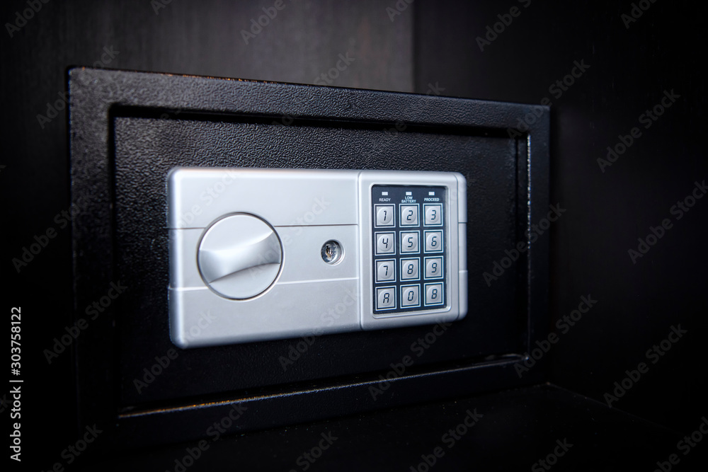 Small safe on shelf in your home or hotel Small safe on shelf in your home or hotel