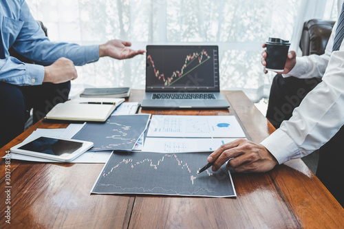 Businessman on meeting conversation and collaboration discussing of partner cooperation to planning in investment trading marketing project to investor of deal on a stock exchange to business profit