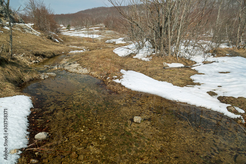 Snow melt on the Velebit mountain, Croatia