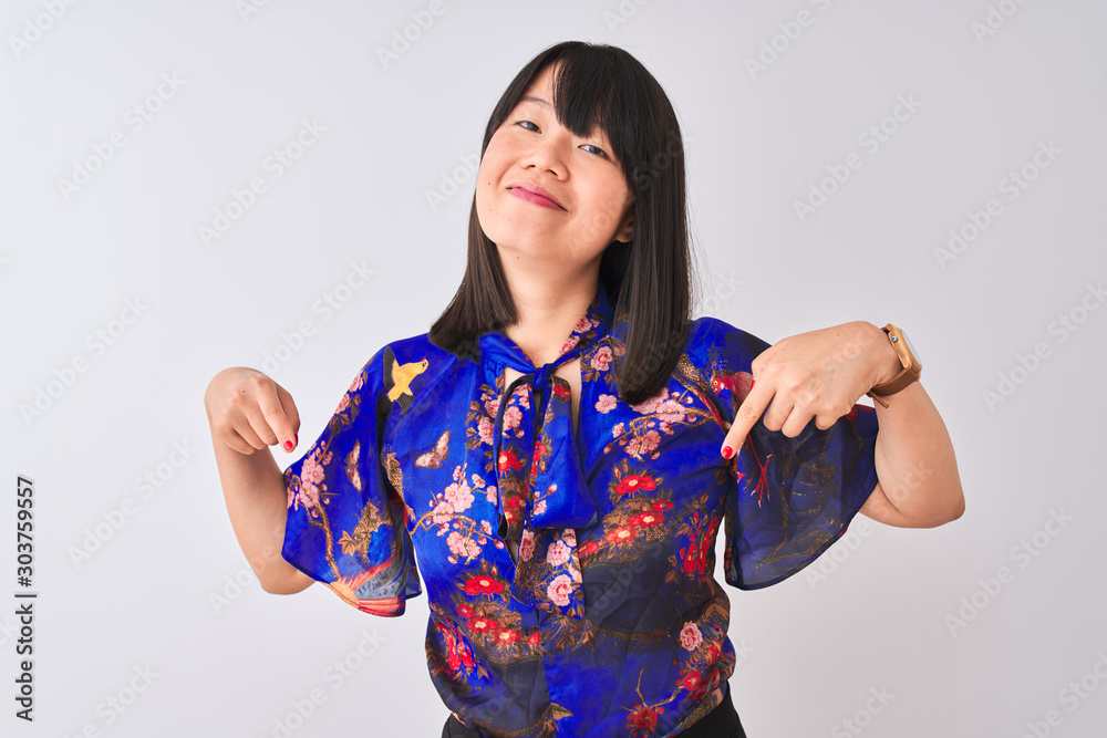 Young beautiful chinese woman wearing summer floral t-shirt over isolated white background looking confident with smile on face, pointing oneself with fingers proud and happy. Young beautiful chinese woman wearing summer floral t-shirt over isolated white background looking confident with smile on face, pointing oneself with fingers proud and happy.