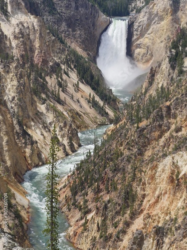 Portrait scenic view of the Lower Yellowstone Falls, one of the most visited sites at the Yellowstone National Park in Wyoming.