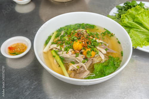 Close-up photo of Vietnamese chicken Pho noodle soup bowl