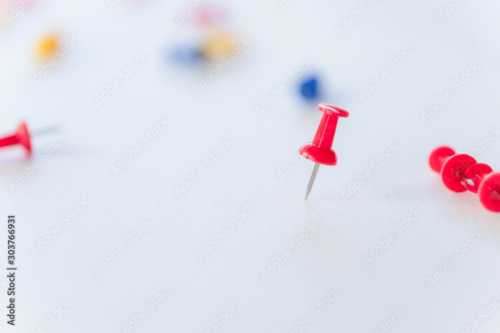 close-up of pins on white background,front view. close-up of pins on white background,front view.