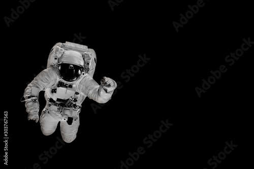 Fototapeta Naklejka Na Ścianę i Meble -  astronaut flies over the earth in space.
