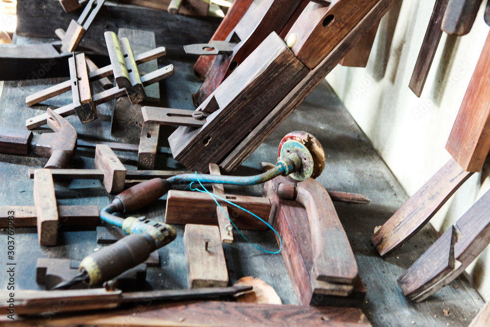 Antique Thai carpentry tools made from wood and steel. Antique Thai carpentry tools made from wood and steel.
