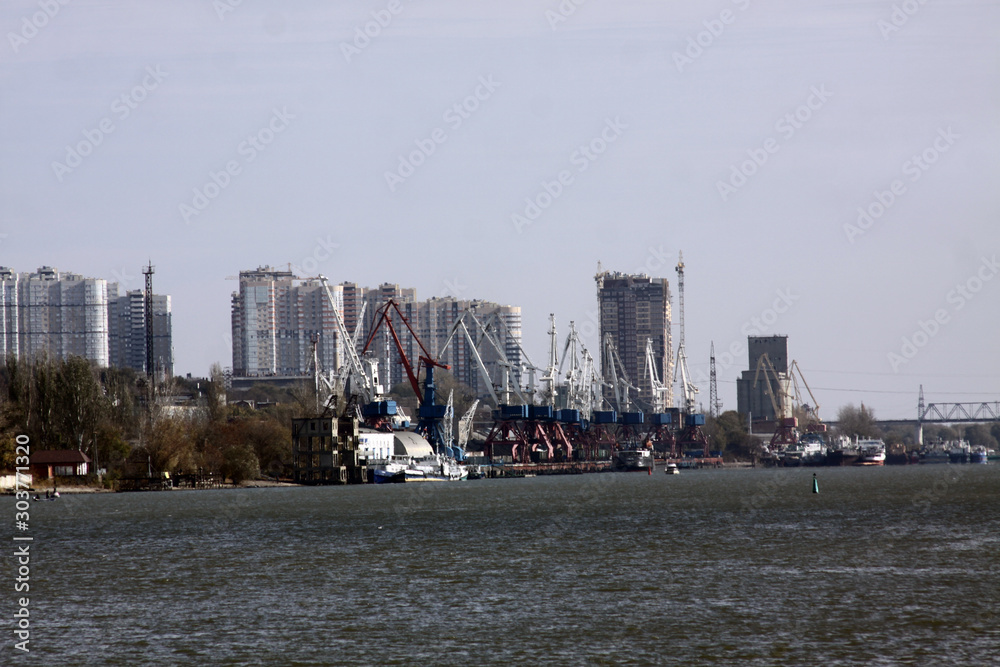 view over river port with cranes