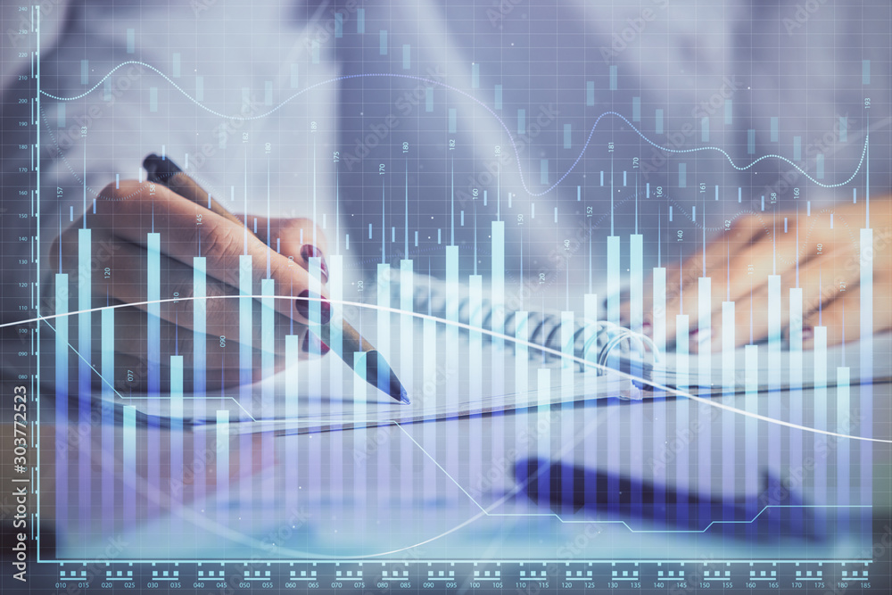 Double exposure of woman's hands making notes with forex graph hologram. Concept stock market analysis. Double exposure of woman's hands making notes with forex graph hologram. Concept stock market analysis.