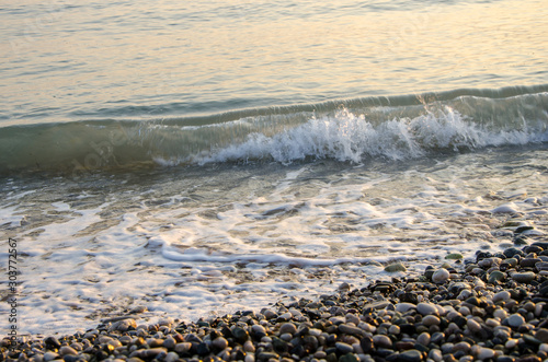Fototapeta Naklejka Na Ścianę i Meble -  Beautiful sea waves at sunrise