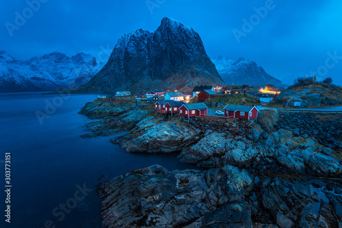 night scene of nufjord town in lofoten islands © jon_chica