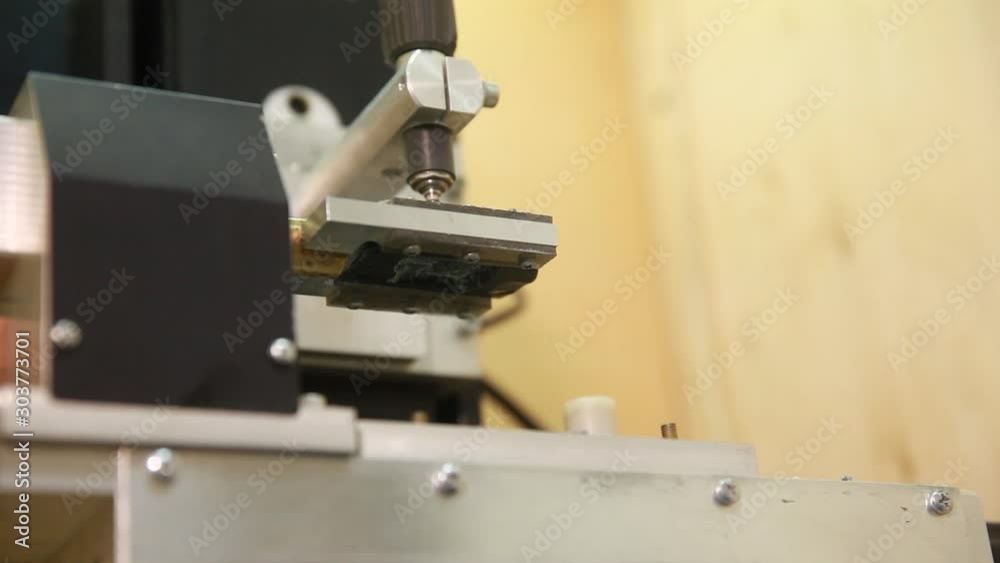 Concept of production and woodworking. Wood processing milling machine Concept of production and woodworking. Wood processing milling machine