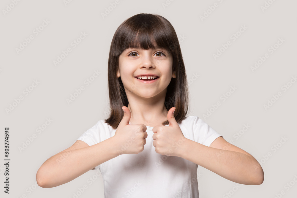 Close up portrait with smiling little brown-haired girl. Close up portrait with smiling little brown-haired girl.