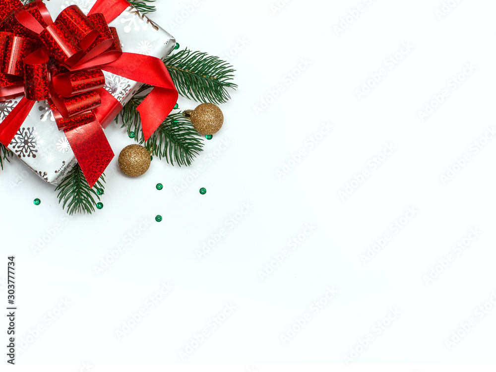 Designer white background for the design of banners and posters for the New Year with red Christmas balls and gift.