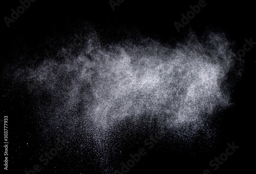 Texture of a snowstorm isolated on a black background, Clusters of stars in space, dynamic scattering of particles