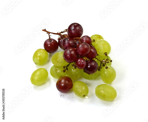 A bunch of overripe grapes isolated on white background.