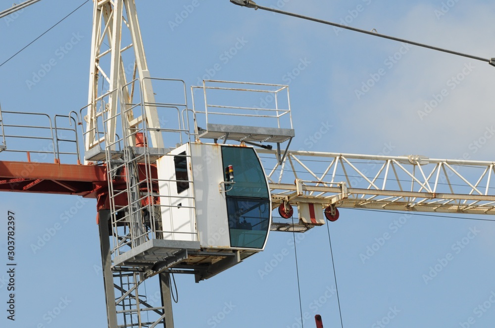 Fototapeta premium Construction crane operator cabin closeup on a highrise building construction site. Gosford. Australia.