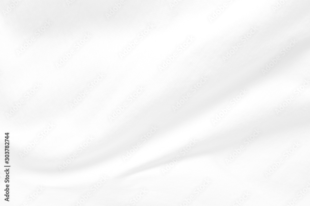 White cloth background abstract. Fabric is wrinkled and sofe wave. Material are used in textile assembly. White cloth background abstract. Fabric is wrinkled and sofe wave. Material are used in textile assembly.