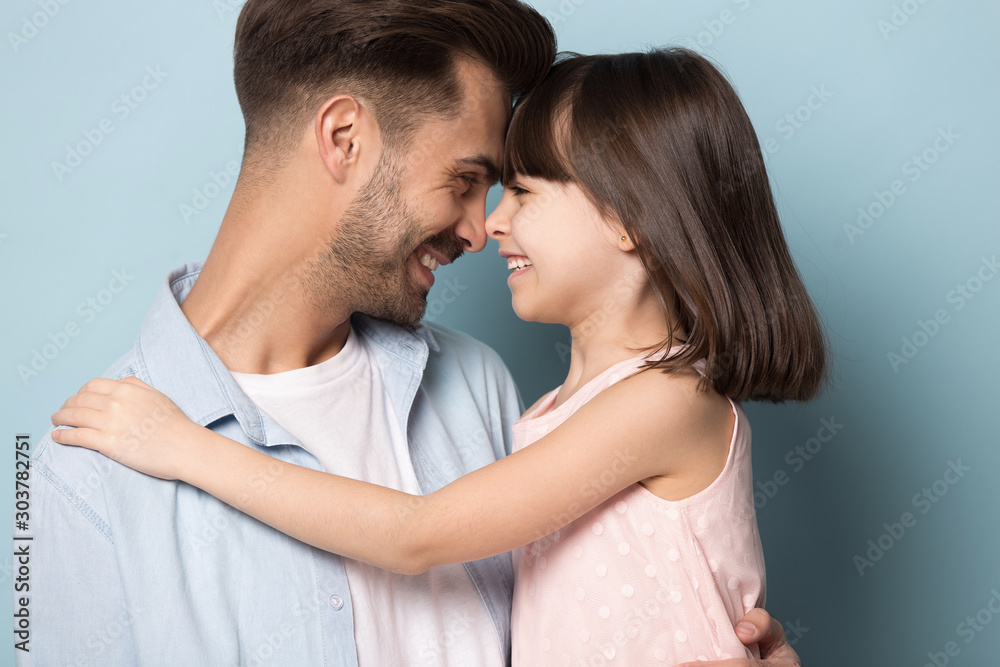Close up portrait with smiling parent and little brown-haired girl. Close up portrait with smiling parent and little brown-haired girl.