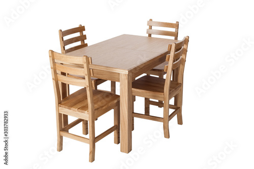 A set of kitchen furniture made of natural wood, a dining table and four chairs, isolated on the white background.